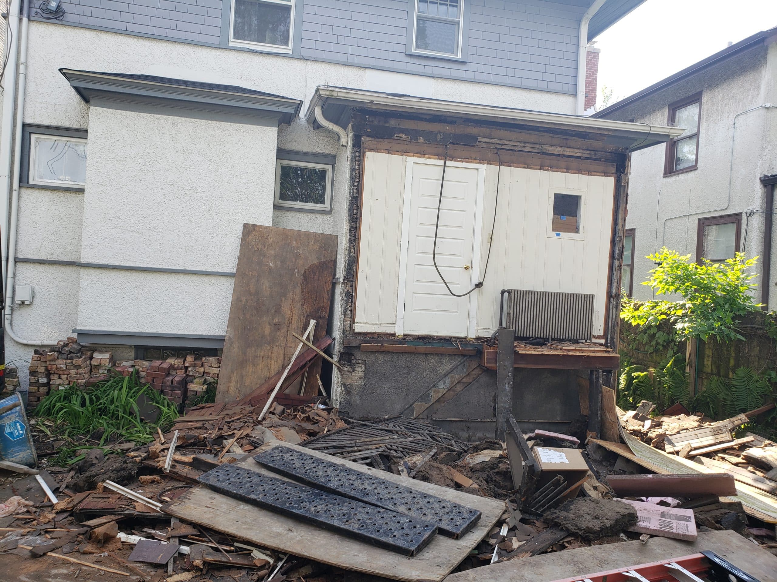 In Progress | Chicago, IL Sunroom tear down from further angle