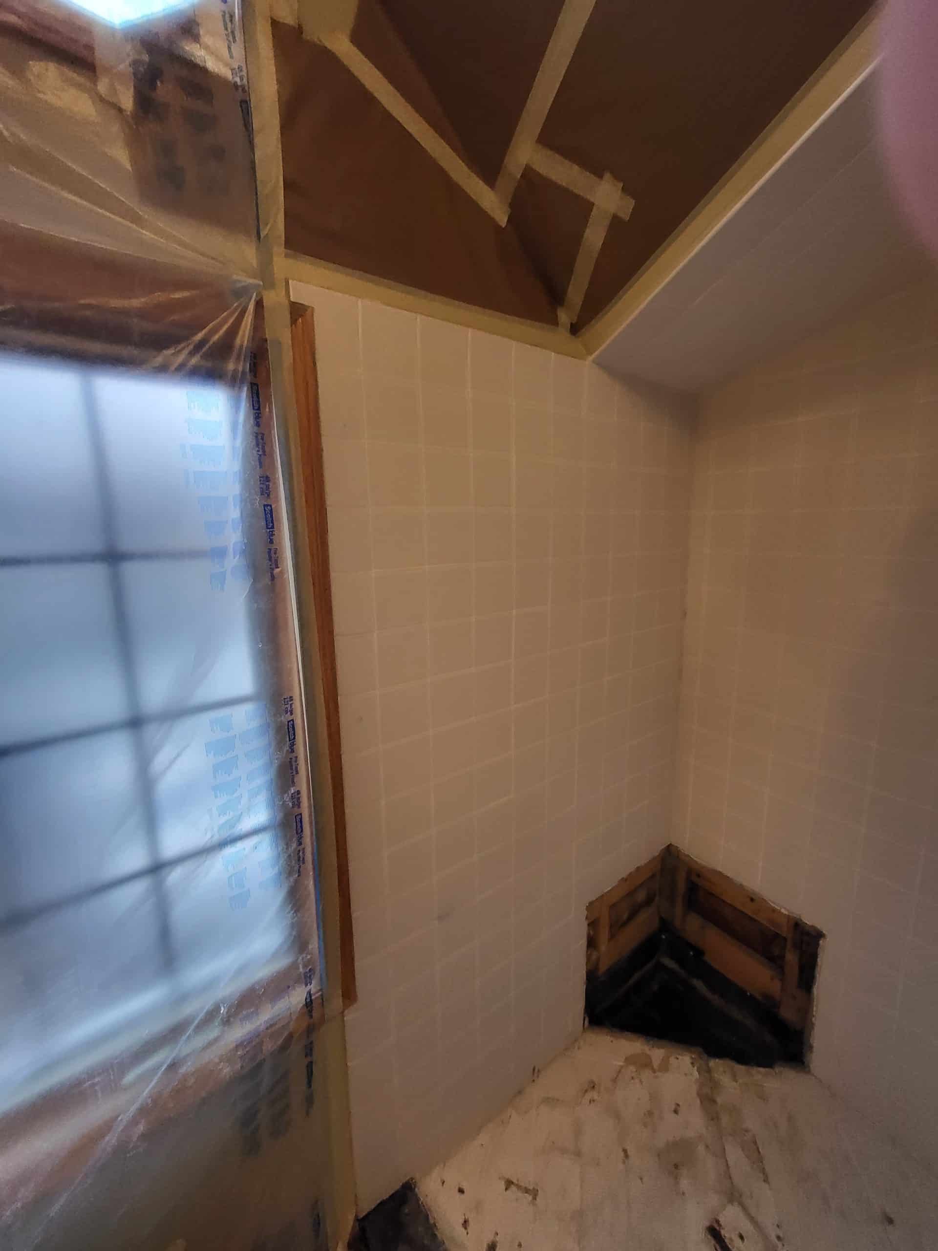 Before | Deerfield, IL Sloped Shower Remodel