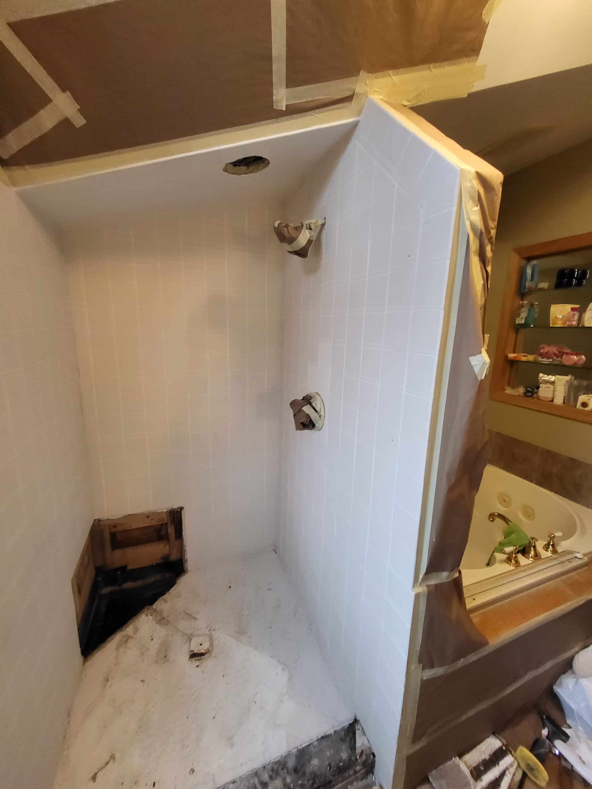 Before | Deerfield, IL Sloped Shower Remodel